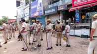 Police personnel stand guard at an area in Nuh. (Photo Credit: ANI)