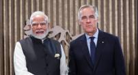 PM Modi, Mark Carney